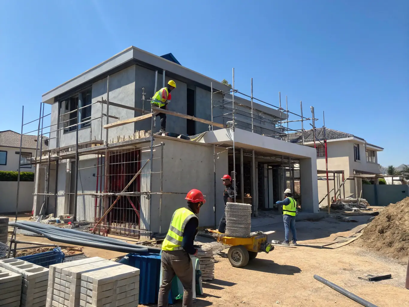 An image of a construction site in Brian Head, Utah, showing a partially completed home with a focus on the quality of the framing and the attention to detail in the construction process.